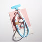 Cloud and star keychain displayed alongside other colorful accessories