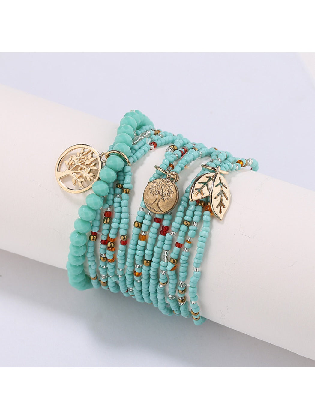 Lovra leaf pendant bracelet displayed with natural lighting emphasizing bead colors