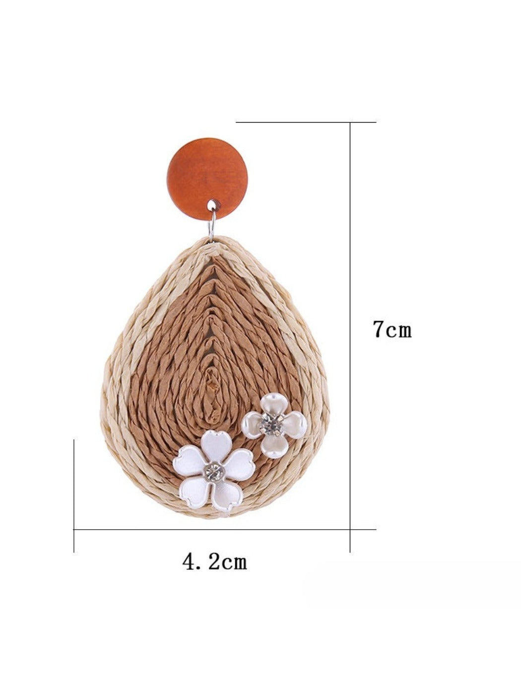 Side view of raffia woven teardrop earrings showing texture and weave detail