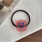 Gifty - Stylish Smiley Face Hair Tie