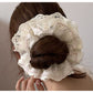 Gifty lace trim tiny floral scrunchie displayed on a white background