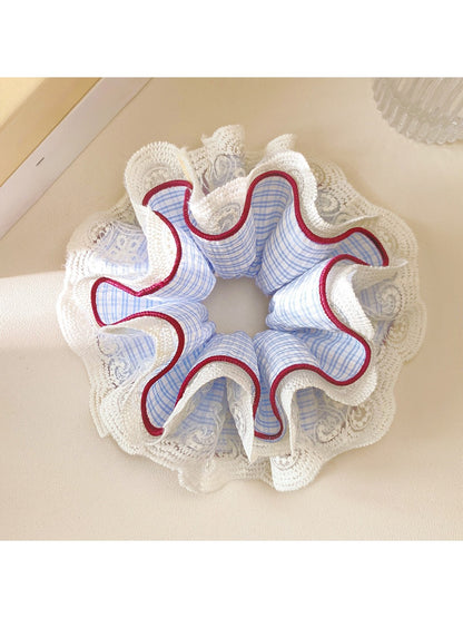 Gifty cute plaid scrunchie with lace trim on a white background