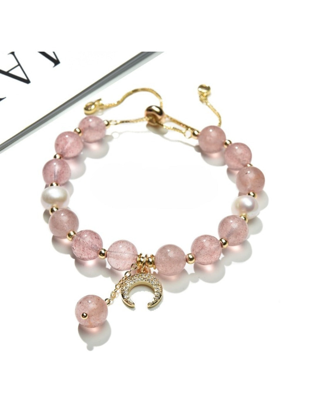 Lovra colorblock bracelet displayed on a wrist, highlighting its elegant pink crystals
