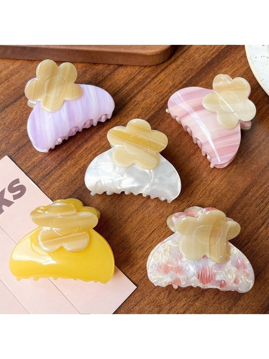 Beau hair clip with colorful flower pattern on a white background