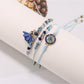 Lovra small bead tassel alloy bracelet coiled with tassel hanging down