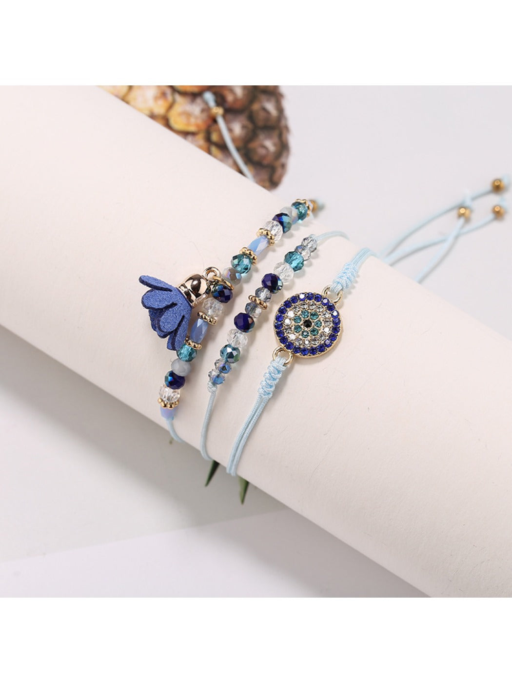 Lovra small bead tassel alloy bracelet coiled with tassel hanging down