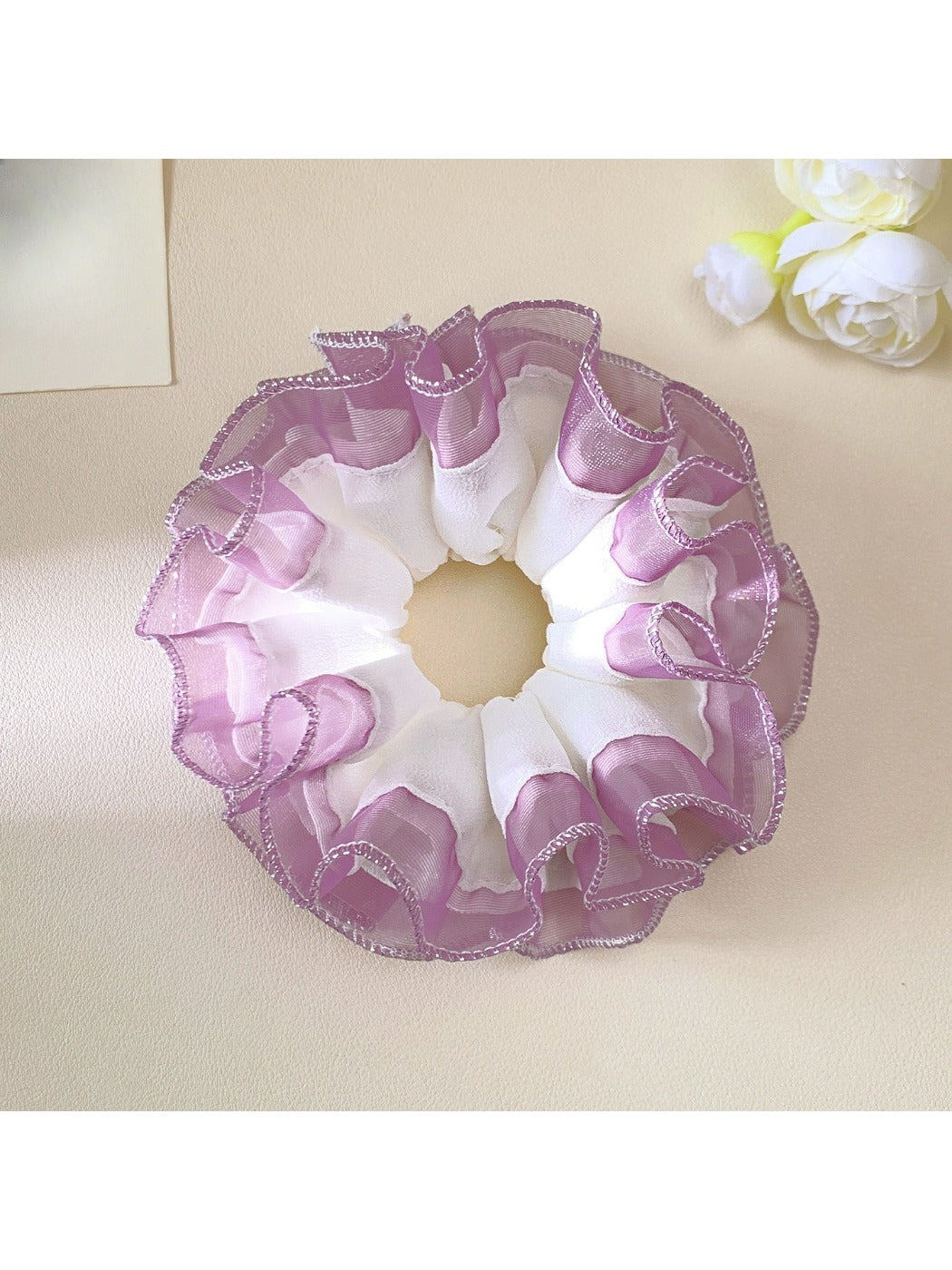 Side view of Gifty minimalist scrunchie showing layered tulle ruffles