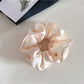 Gifty - Textured Satin Spiral-Shaped Hair Tie