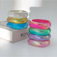 Lovra colorful irregular shaped bangle bracelet on white background