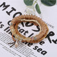 Detailed shot of Lovra bracelet clasp and bead texture in natural light