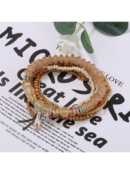 Detailed shot of Lovra bracelet clasp and bead texture in natural light