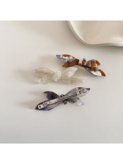 Beau retro bow acetate hair clip displayed on white background