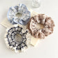 Gifty vintage plaid ruffle scrunchie in soft fabric with gathered ruffle detail