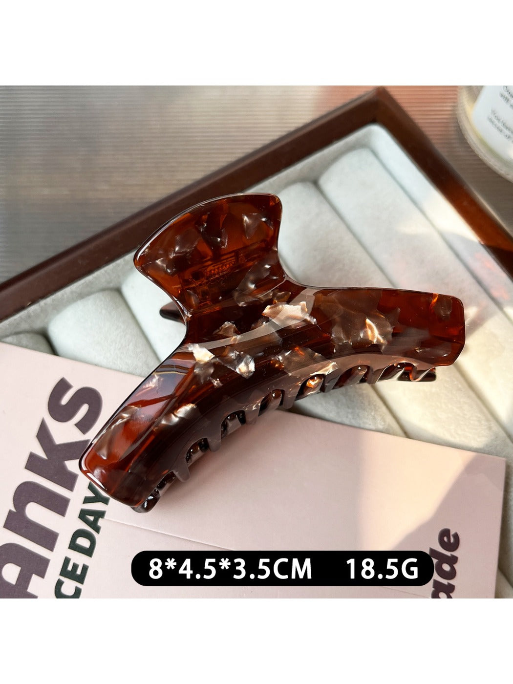 Beau claw clip shown alongside matching hair accessories on a neutral background