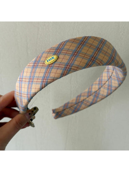 Top view of Gifty college style headband showing full patterned design
