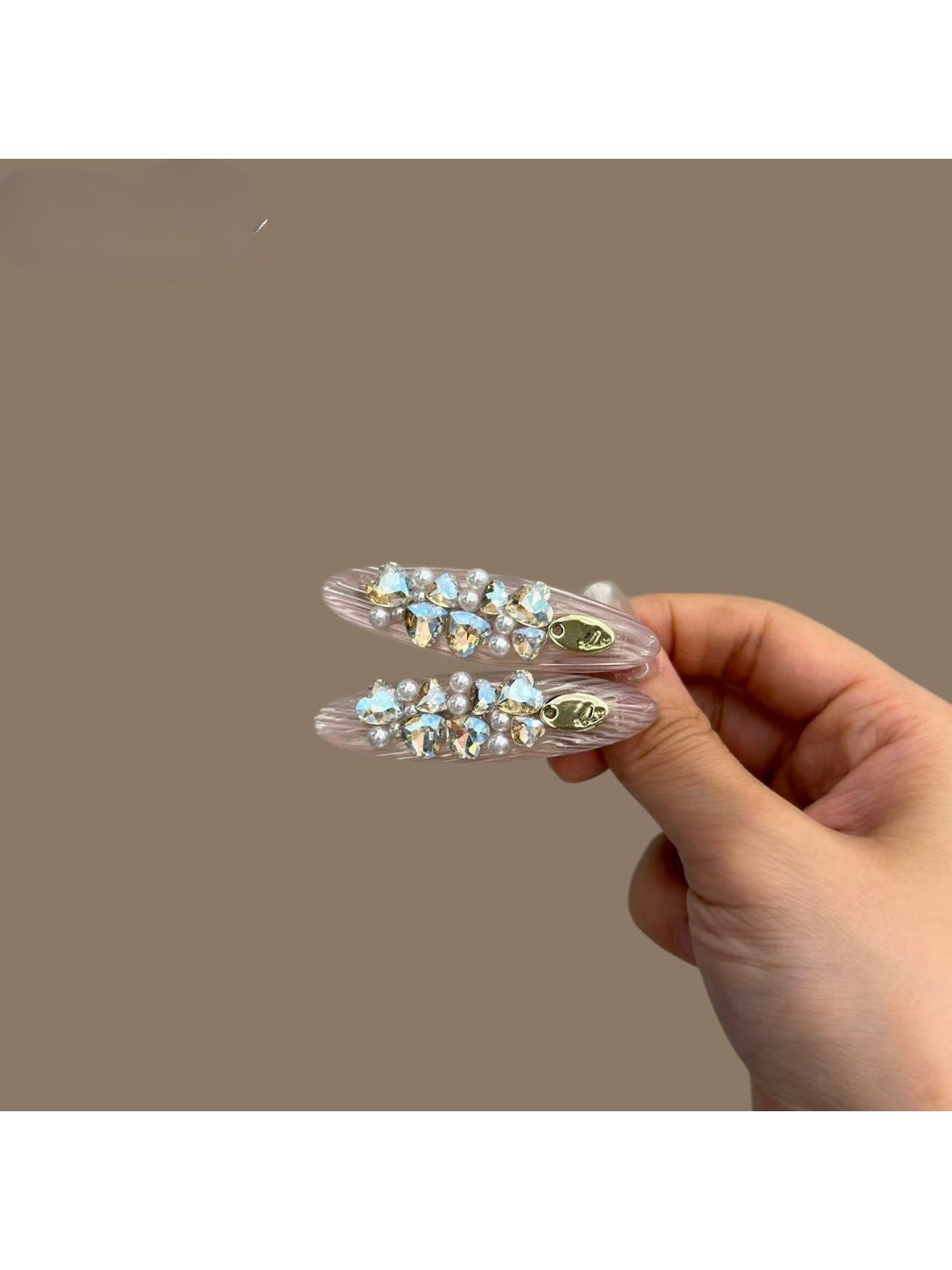 Side view of Beau hair clip highlighting rhinestone arrangement and clasp mechanism