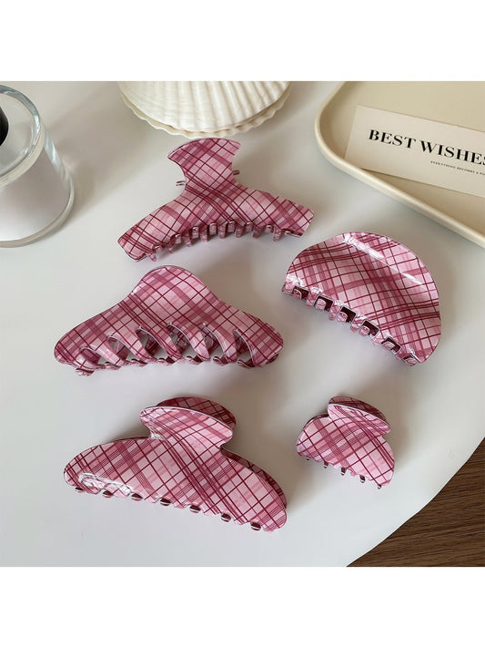 Close-up of Beau elegant pink plaid hair claw clip on white background
