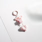 Side view of Keypus bow heart beaded keychain highlighting bead arrangement