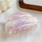 Beau hair claw clip with glossy finish and subtle cloud motifs