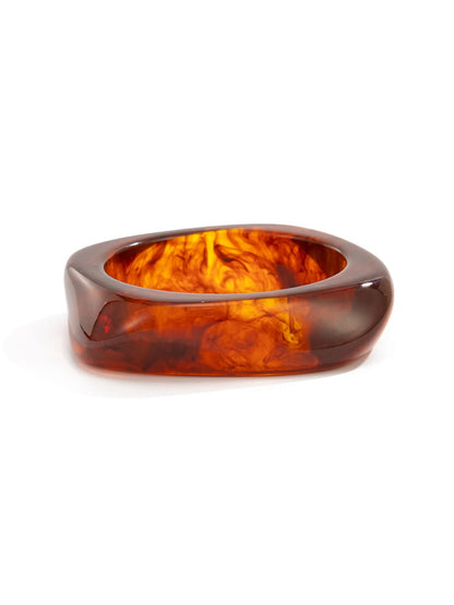 Lovra vintage marble pattern wide bracelet placed on wooden surface for styling