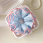 Close-up of Gifty Sweet Striped Four Layer Scrunchie showing pastel pink and white stripes
