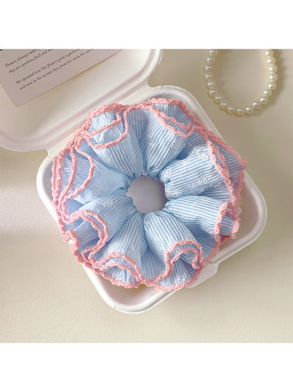 Close-up of Gifty Sweet Striped Four Layer Scrunchie showing pastel pink and white stripes