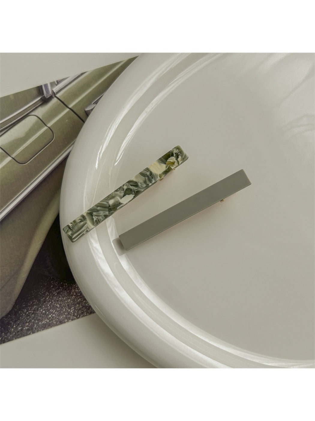 Beau straight bar hair clip shown from angled perspective focusing on shape
