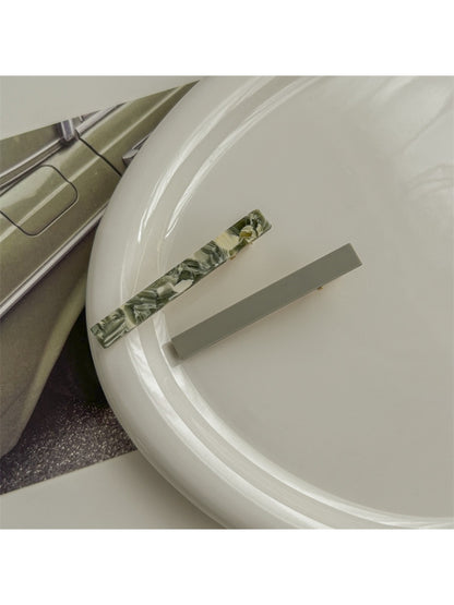 Beau straight bar hair clip shown from angled perspective focusing on shape