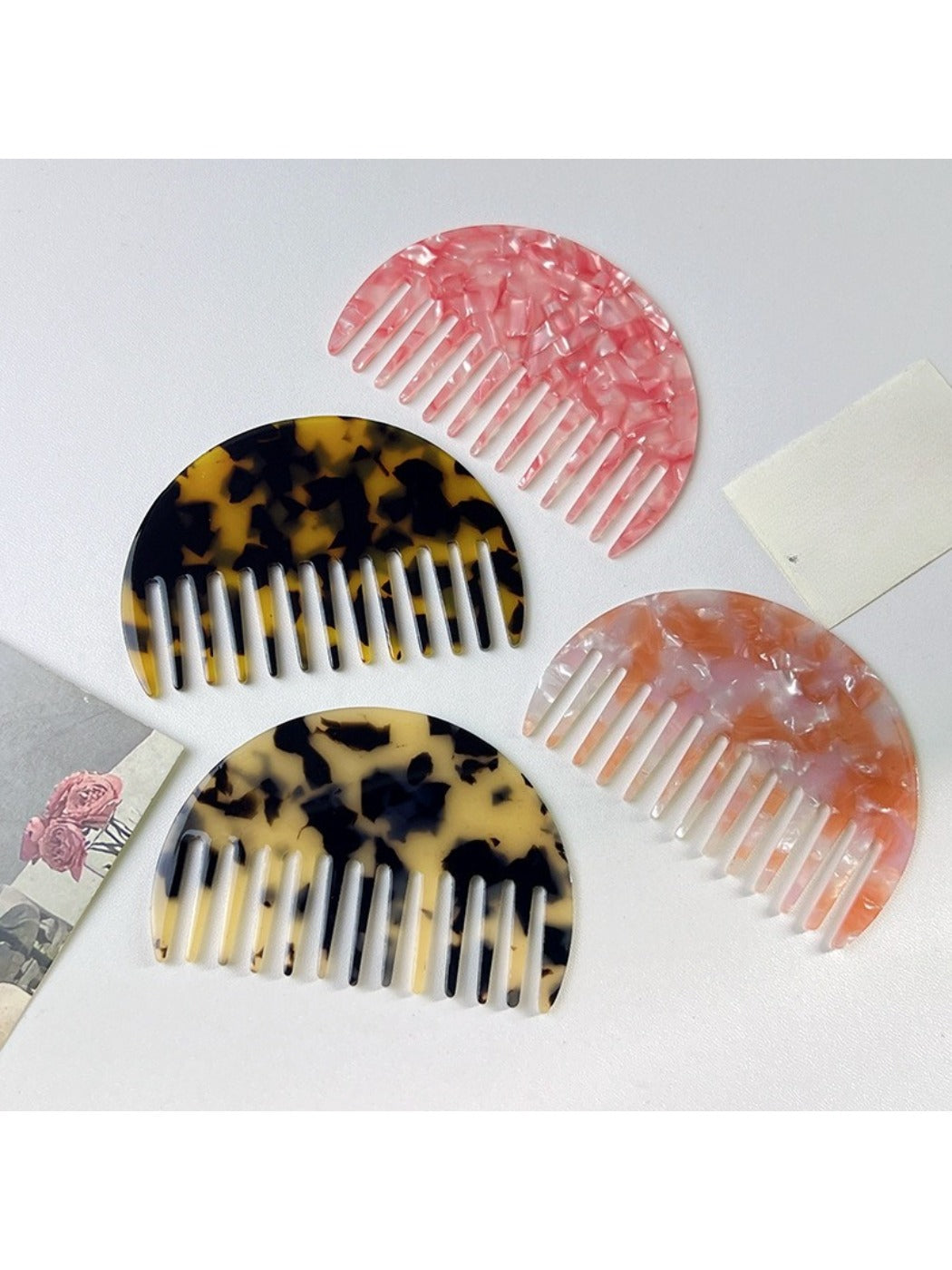 Side view of Camerow acetate hair comb showing thickness and shape