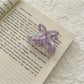 Top view of Beau romantic butterfly shaped claw clip showing smooth acetate finish
