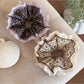 Close-up of Gifty Retro Lace Floral Scrunchie in beige with intricate lace and floral pattern
