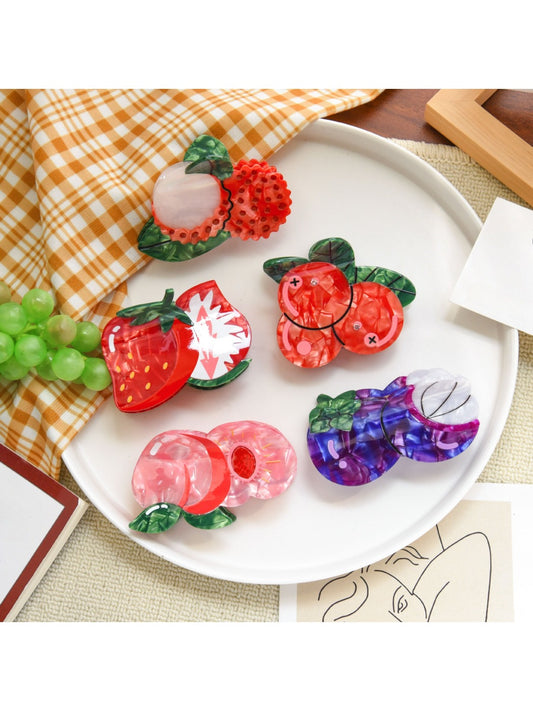 Beau stylish fruit shaped hair clip with orange slice design on white background