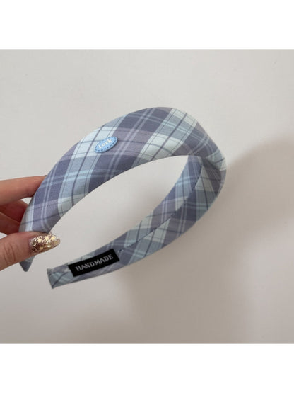 Side view of Gifty Sweet Plaid headband highlighting the wide edge and plaid pattern