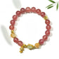 Lovra minimalist goldfish pendant on a delicate crystal bead bracelet