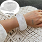 Lovra minimalist wide fit bracelet shown from above on white surface
