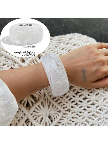 Lovra minimalist wide fit bracelet shown from above on white surface