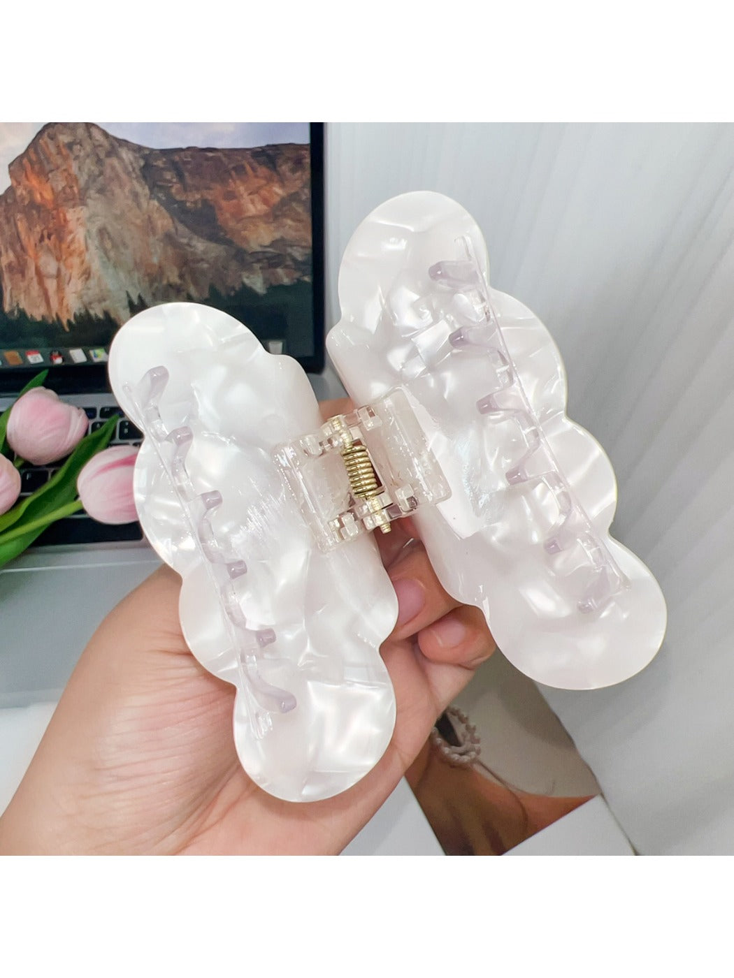 Side view of Beau elegant cloud shaped hair claw clip highlighting the clasp mechanism