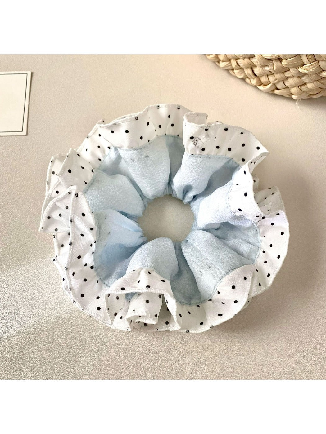 Gifty elegant scrunchie with color block design and white polka dots on navy blue fabric