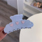 Beau Pretty Heart Patterned Hair Clip shown with matching accessories on a flat surface