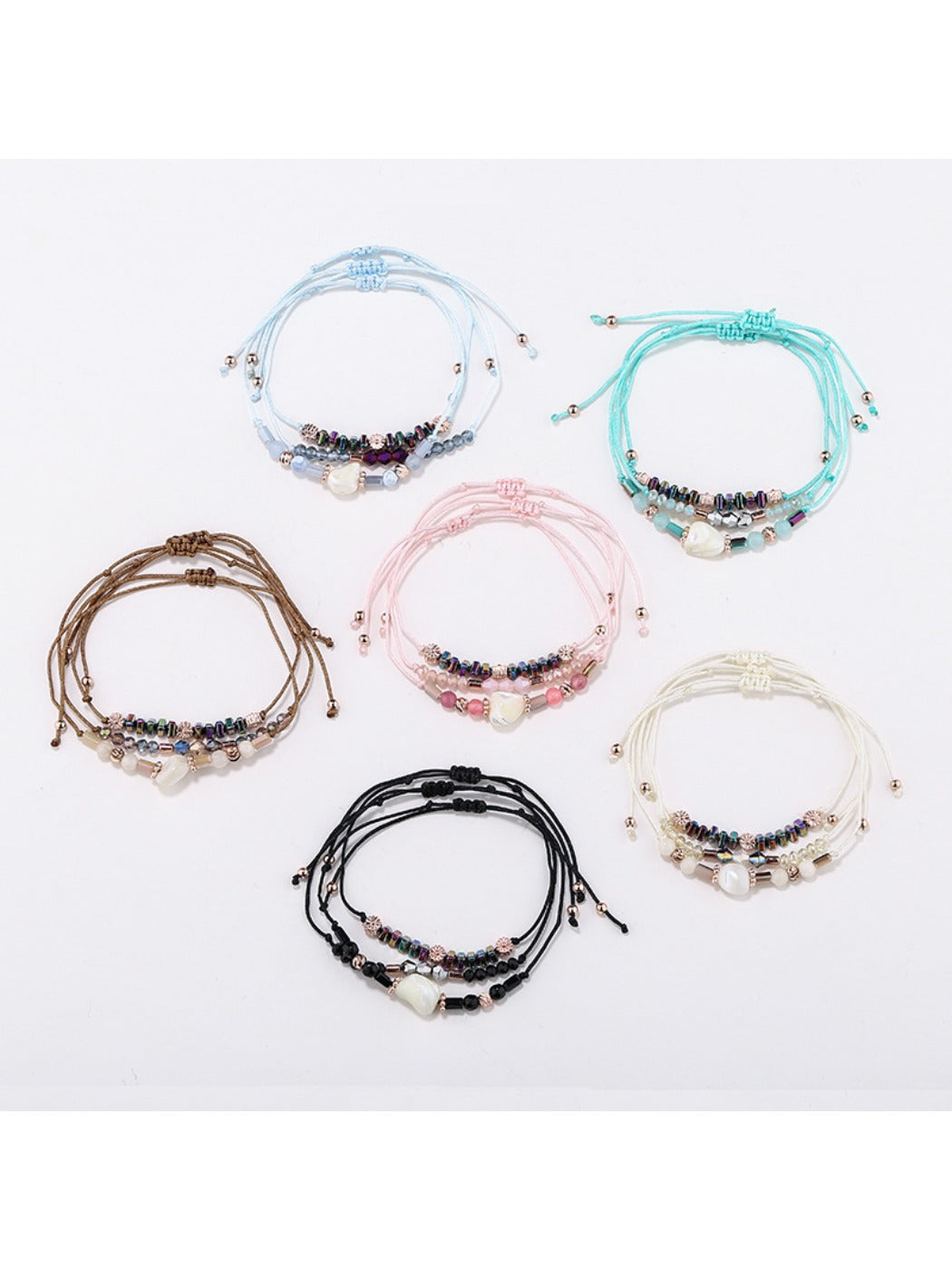 Close-up of Lovra beaded woven cord bracelet with multicolored beads on black cord