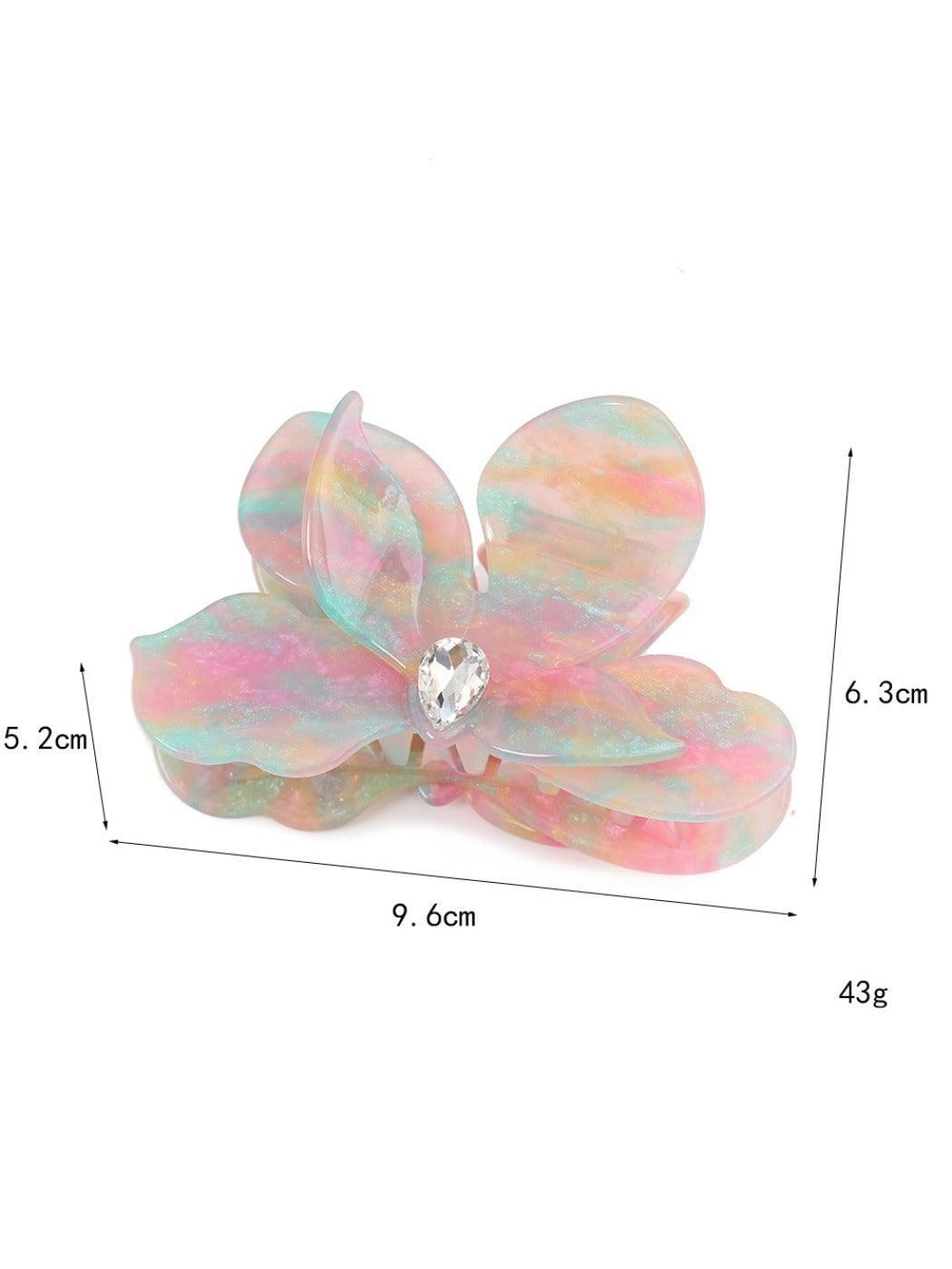 Close-up of Beau acetate moth orchid claw clip clasp mechanism in beige acetate