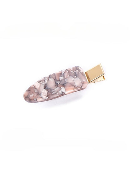 Beau vintage textured hair clip shown with packaging box