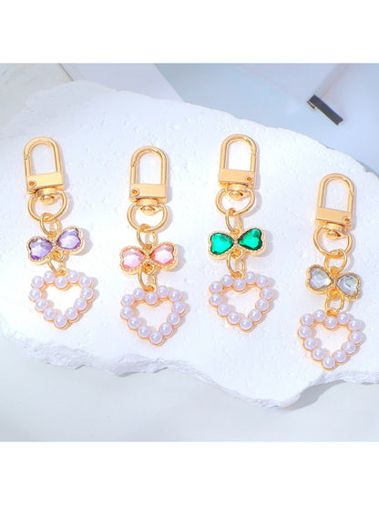 Top view of a pastel beaded heart keychain showing detailed beadwork