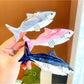Beau shark shape claw clip in matte black, side view showing teeth design