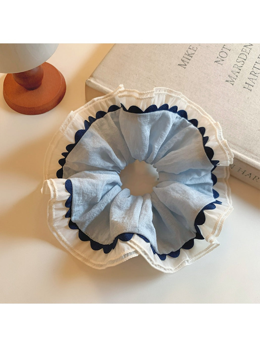 Gifty ruched scrunchie showing color block design with pink, beige, and cream tones