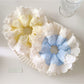 Close-up of Gifty elegant minimalist polka dot scrunchie in white with black dots