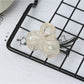 Beau small butterfly claw clip photographed from above showing full shape