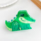 Beau hair claw clip shown from top angle highlighting animal shape design