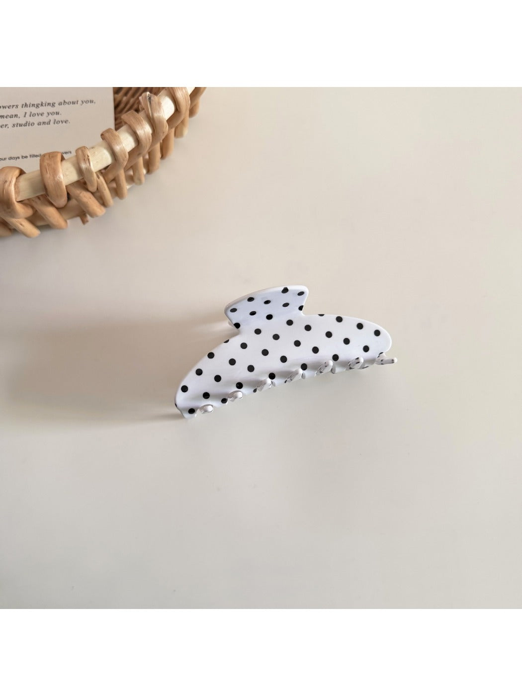 Beau hair clip worn in styled hair, showcasing size and decorative effect