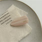 Beau acetate hair clip with pink marbled pattern close-up